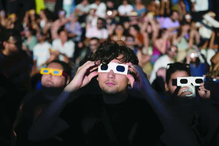 Millions crowd Spanish cities to see country's first total solar eclipse in over a century